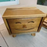 The Artisan Smiley Sentinel – Handcrafted Solid Teak Vertical Tissue Gallery